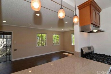 Kitchen Area Overlooking into the Living Room