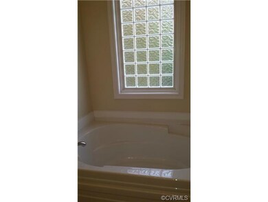 Soothing soaking tub in the master bath.