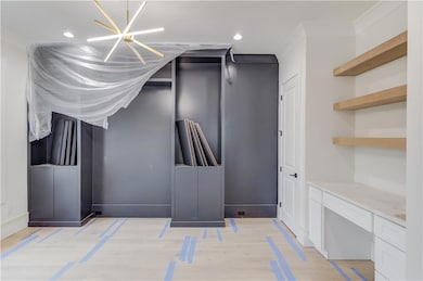 Mudroom with recessed lighting and light wood-styl