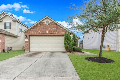 This home features a charming brick exterior with