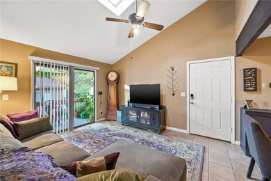 Vaulted ceiling living room view from hallway