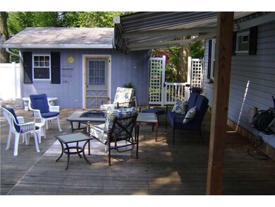 Patio/Deck. Convenient storage shed painted to mat
