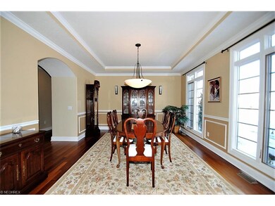 The lovely formal dining room with tray ceiling, c
