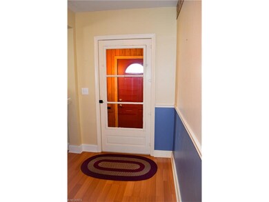 FRONT ENTRANCE. CONVENIENT MUD ROOM.