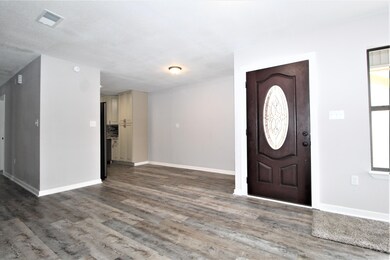 Entry, Dining Space to Kitchen