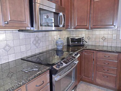 Castled cabinetry, granite counter tops...