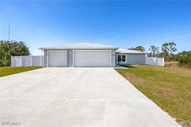 Offering a 3 car garage and plenty of driveway par