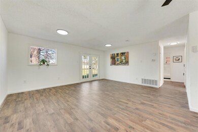 Empty room featuring hardwood / wood-style floors,