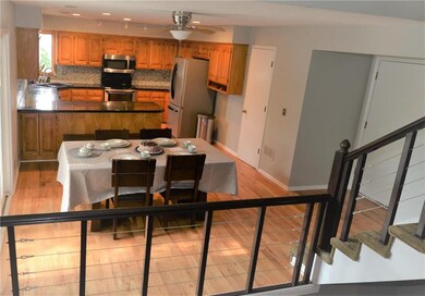 Kitchen and dining viewed from main level - Garage