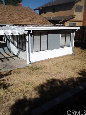 BACK PATIO SUN ROOM NEW CARPET AND PAINT