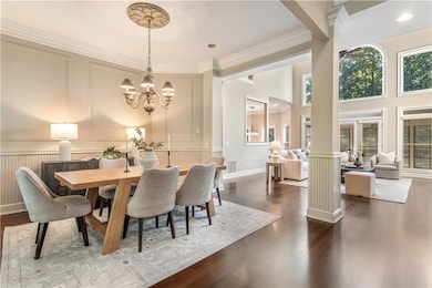 Dining opens to foyer and living room