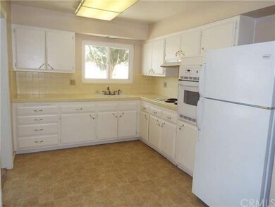 Bright kitchen. Refrigerator included.