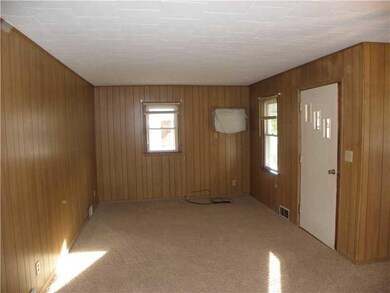 Living Room. Large Living Room w/ Newer Carpeting 