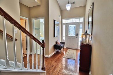 Etched glass door with side lights and transom win
