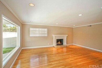 View to the open Family Room from the Dining Room.