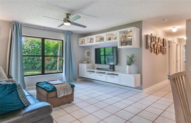 This pleasant Family Room looks out onto the side