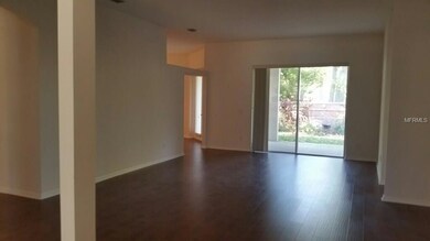 Formal Living Room with sliders leading to covered Lanai