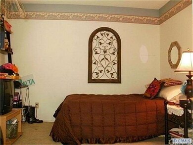guest den/bedroom with french doors
