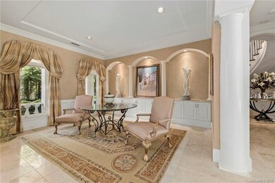 Formal Sitting Area Surrounded by Fine Works of Ar