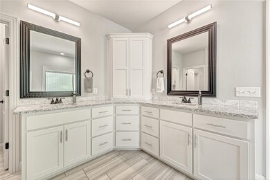 Dual vanity sinks in master bathroom