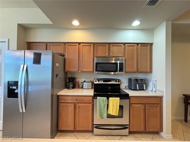 10341 Heritage Bay Blvd unit 1922, Naples, FL 34120 - photo 7