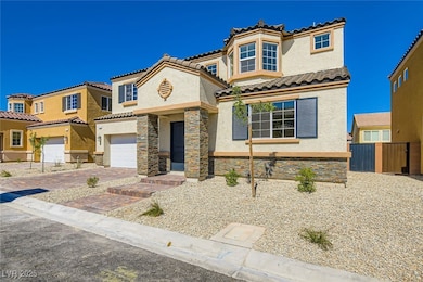 View of front of house with stucco siding, a garag