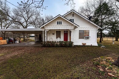 View of front of home featuring cooling unit and a