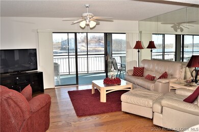 Beautiful open floor plan with wood floors and Eastern exposure