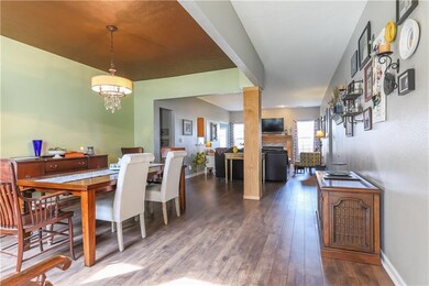 The dining room is open and plenty of room for family meals or entertaining.