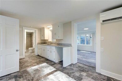Another view of the kitchen to Family Room and Ful