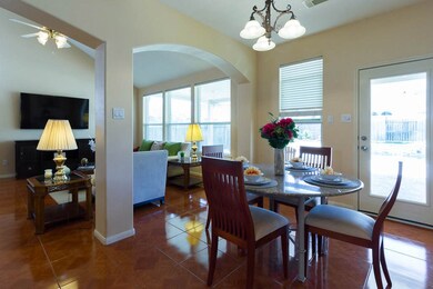 The dining room is right next to the living room and kitchen.  It's a very open plan.  Great for entairtaining.
