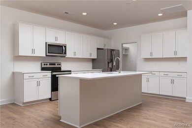 Kitchen featuring stainless steel appliances, a ki