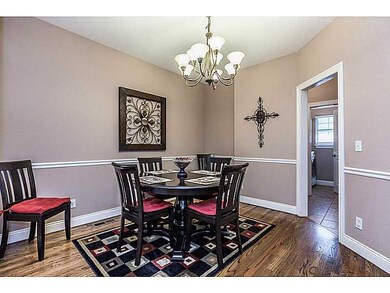 Dining Room. There is a place for another table close to the kitchen, and also a counter for bar stools.