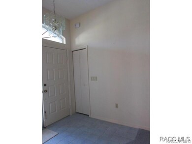 Guest coat closet in foyer