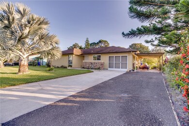 Carport w/extra driveway