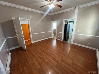 Unfurnished bedroom featuring ensuite bath, ceilin