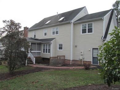 Additional rear view with gutters, downspouts and 