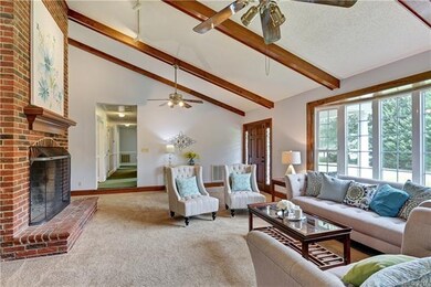 Family room with floor to ceiling fireplace