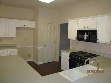 Open and spacious with breakfast bar for at least 