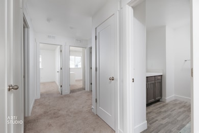 Corridor featuring baseboards