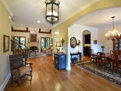 Gracious entry leading into vaulted great room wit