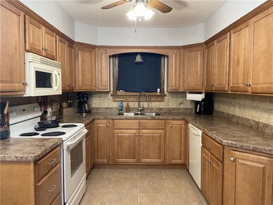 Includes dishwasher, microwave, electric stove, disposal, & Refrigerator.