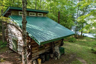 6 Aerial of cabin toward fire ring