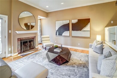 Living room with hardwood floors, fireplace and 9'
