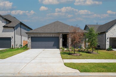 Facade - dead tree has been replaced.