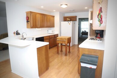 Open kitchen with wrap-around bar