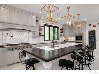 Kitchen. This kitchen boasts quartz counter tops, 