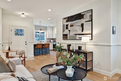 Sunlit living spaces that blend function & style for an incredibly livable layout.