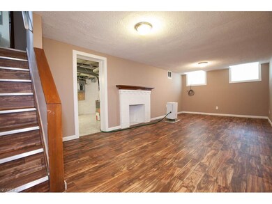 This spacious lower level rec room is great for en