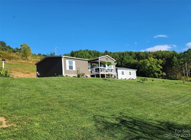 582 John Henry Rd, Burnsville, NC 28714 - photo 7